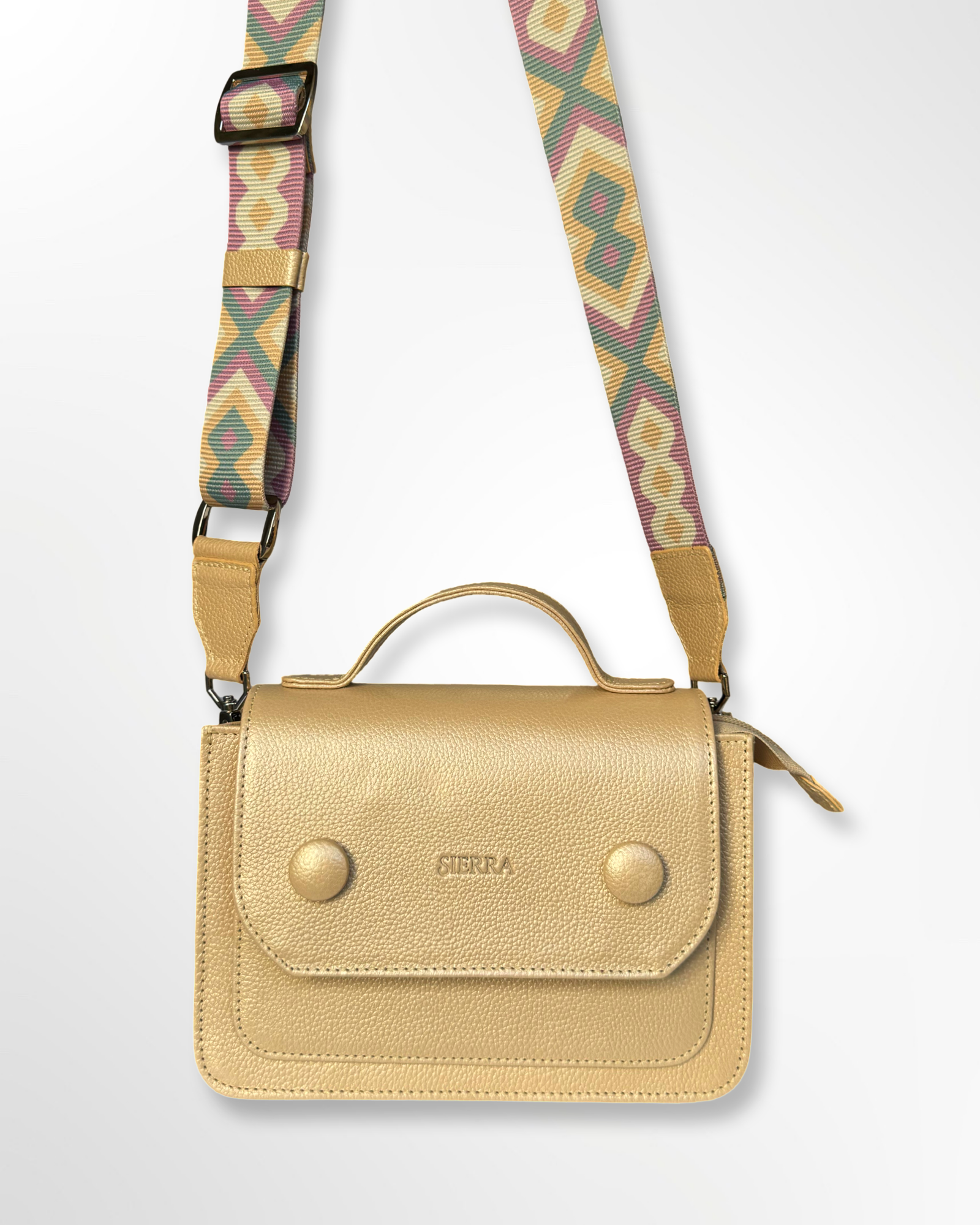 Cartera manos libres en cuero con cargadera tejida Bella dorado