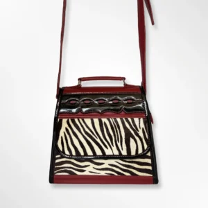 Cartera manos libres para dama en cuero animal print Tania rojo animal print 2
